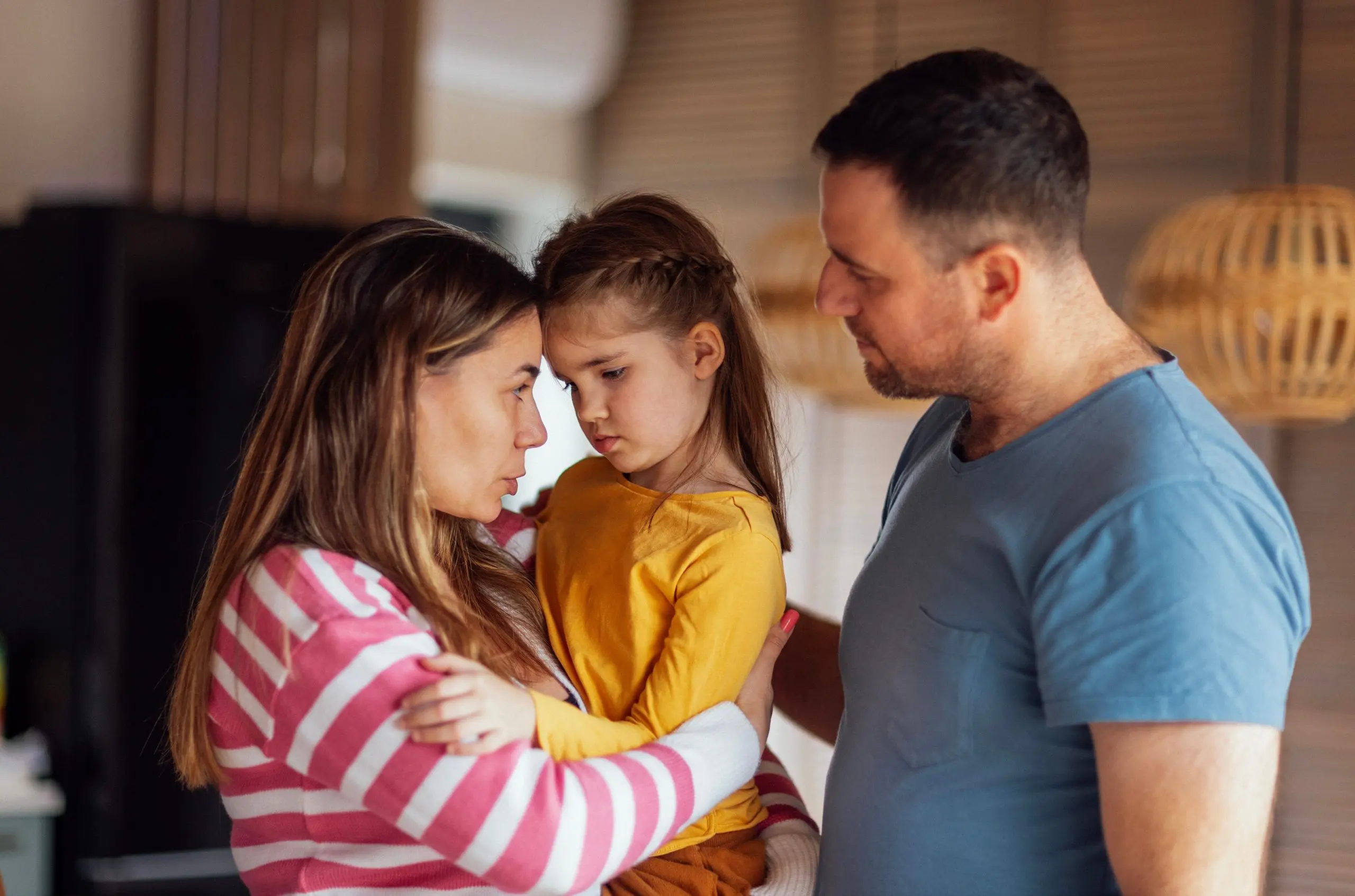 Parents talking to child.