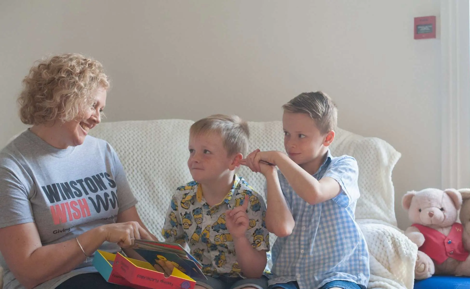 Winston's Wish practitioner with two young boys