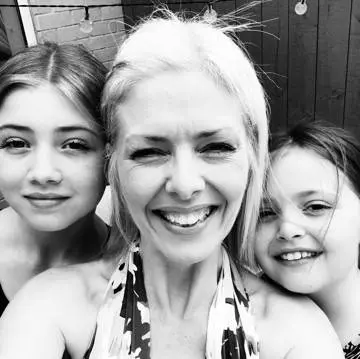 Debbie, Lizzie and Hattie Black and white photo of Debbie, Lizzie and Hattie smiling