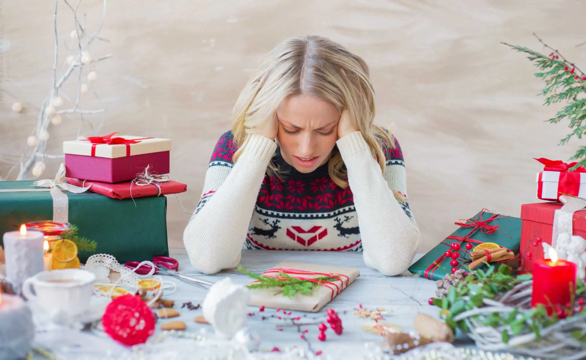 Stressed mum sat at a table wrapping presents - Winston's wish