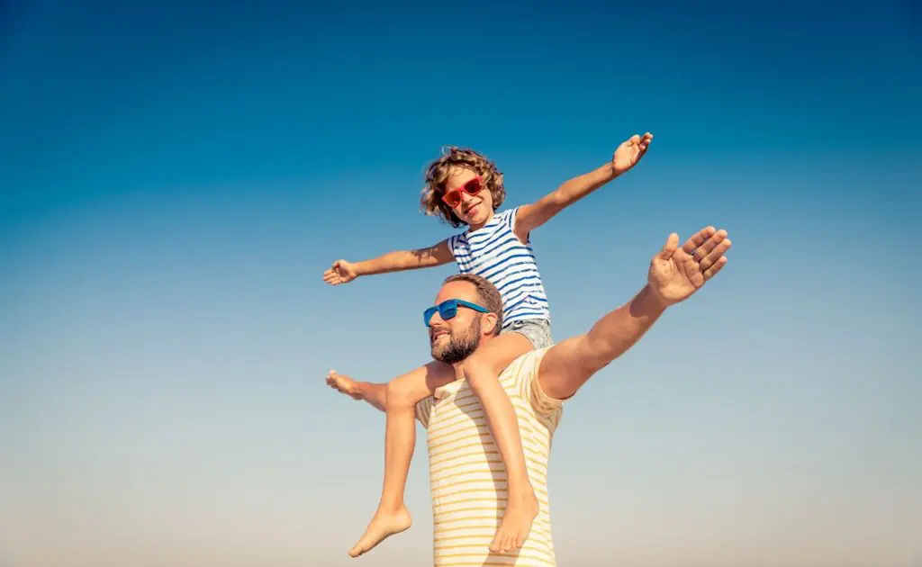Dad and son on summer holiday