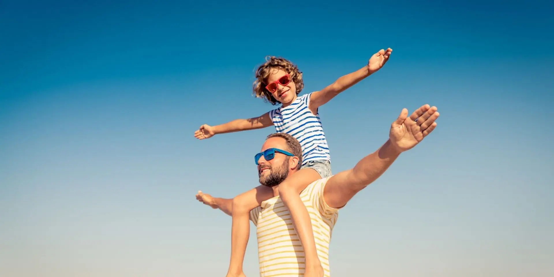 Dad and son on summer holiday